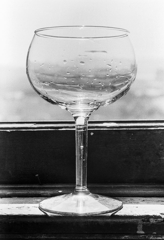 Wine glass in WJLY loft after a long party