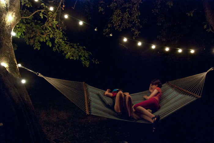 Girls on a hammock, summer night
